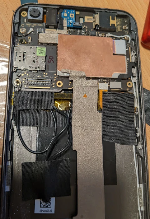 battery PCB externally soldered to phone